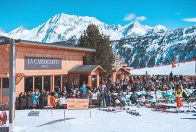 La Casserole's terrace on the snow, peaks behind